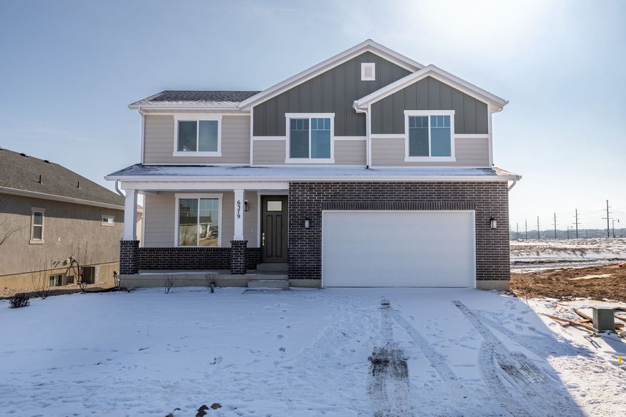 This is our Sofia plan.  3bdrm, 2.5 bath, loft, 9ft ceilings on main but 11ft in the family room, chef's kitchen, daylight basement, laminate flooring throughout the main, quartz countertops throughout, walk-in pantry, and no neighbors directly behind the home....only a walking path!  Come and see this one.  It has amazing views!