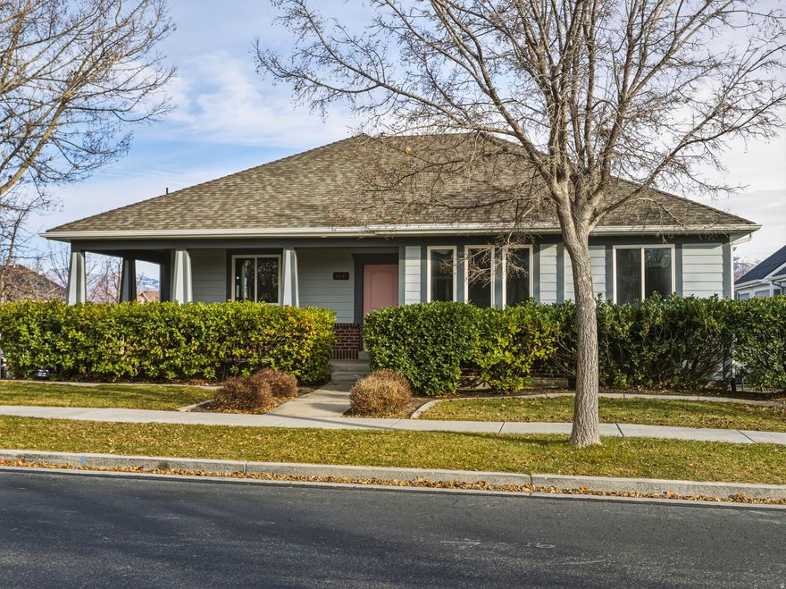 Elegantly situated on a desirable corner lot in the heart of Daybreak, this expansive six-bedroom, four-bath residence is filled with abundant natural light and offers refined living with exceptional versatility. An updated kitchen showcases quartz countertops and thoughtful finishes, creating a stylish and functional centerpiece for daily living and entertaining. The well-designed layout includes a private accessory apartment with seperate entrance, kitche, and laundry, ideal for guests, multigenerational living, or added flexibility. Generous living spaces are bathed in sunlight, blending comfort and sophistication throughout. Residents enjoy full access to Daybreak's sought-after amenities, including parks, trails, lakes, pools, and community events, all contributing to a vibrant and elevated lifestyle.