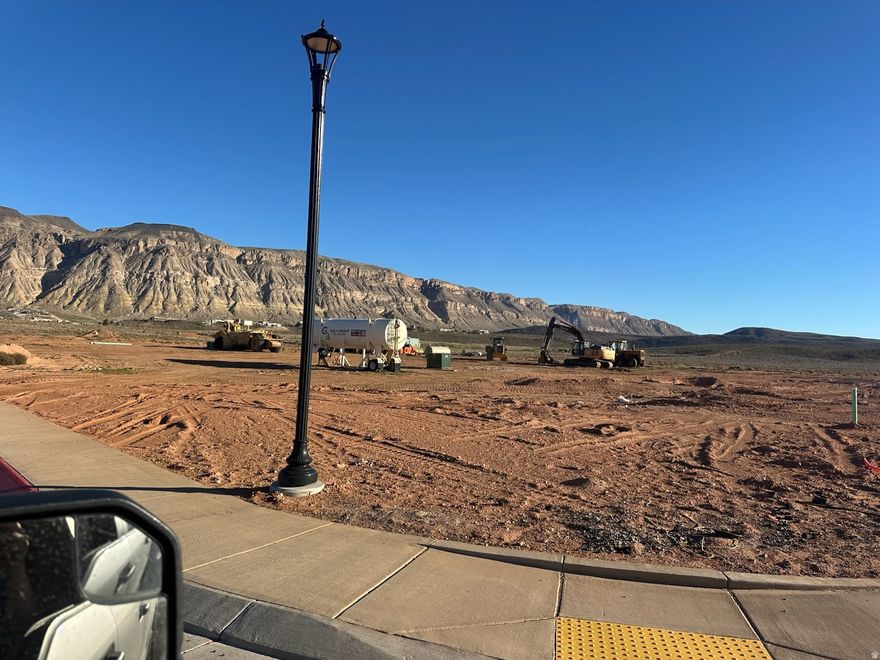 Fully Finished lot, ready to build on. Bring your own builder development.    Resort living without the resort fees. Nestled in between copper rock golf course and south shores ski lake. We have 41 available lots in Phase 3B. Expected completion (finished lots) to be July 1st, 2025. The perfect gift for your investment portfolio. Property is located a short 8 minute drive from Sand Hollow Reservoir.