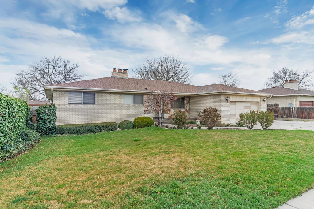 Photo of 6250 S WESTRIDGE ST E, Murray, UT 84107 (MLS # 2146982)