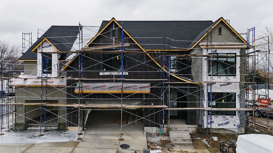 The Avery Floor Plan in Beck Hill Side Neighborhood We are almost sold out in this neighborhood. This stunning transitional two-story home features a breathtaking two-story family room with an abundance of windows, allowing you to bask in natural light and enjoy spectacular views. The home boasts a luxurious butler's pantry with custom cabinetry, a 48" commercial gas range, and a built-in twin fridge/freezer combo-perfect for entertaining and everyday living .Quartz counter tops, White Oak engineered Hardwood floors and so much more.. Basement entrance and it is Scheduled for completion on the first part of March, this home is a must see!