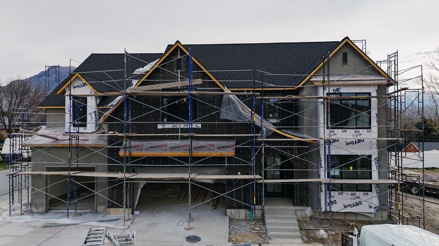 The Avery Floor Plan in Beck Hill Side Neighborhood We are almost sold out in this neighborhood. This stunning transitional two-story home features a breathtaking two-story family room with an abundance of windows, allowing you to bask in natural light and enjoy spectacular views. The home boasts a luxurious butler's pantry with custom cabinetry, a 48" commercial gas range, and a built-in twin fridge/freezer combo-perfect for entertaining and everyday living .Quartz counter tops, White Oak engineered Hardwood floors and so much more.. Basement entrance and it is Scheduled for completion on the first part of March, this home is a must see!