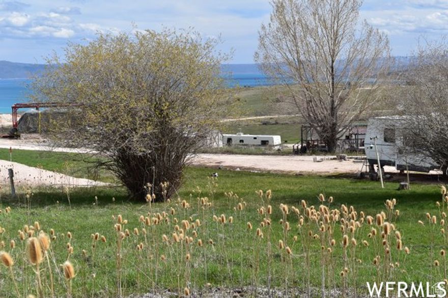 Own your own deeded RV lot in beautiful Bear Lake just north of Fish Haven, Idaho! Enjoy the mountain setting with beautiful view of Bear Lake! Ride directly to Fish Haven Canyon! Close to North Beach State Park. Water is in the road, sewer is a dump station at park entrance. Needs water brought in and lot leveled by the Buyer. POA fee covers all water and power usage, sewer (dump station), Garage, Road & comfort stations maintenance, upkeep and supplies! Come Relax and enjoy your home away from home!