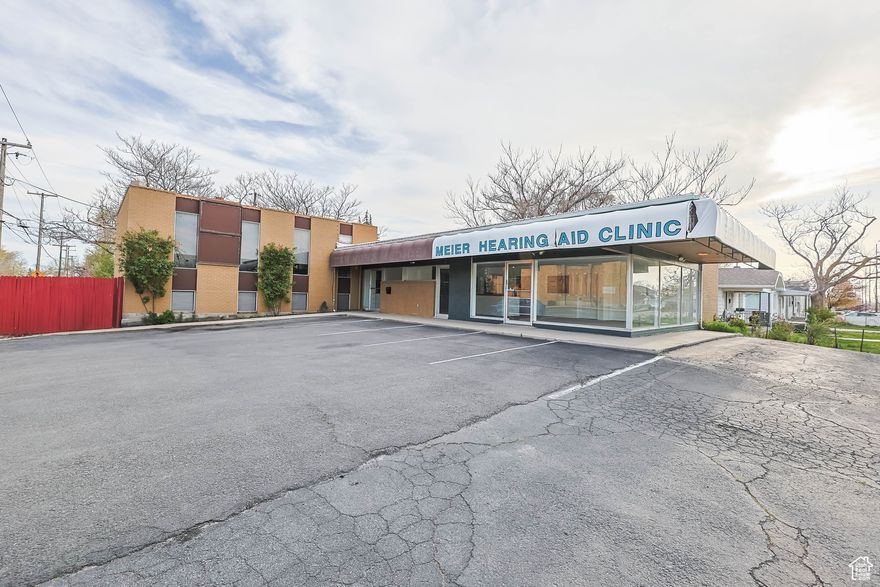 New Price. Strategically positioned on a prominent corner lot, this commercial property offers exceptional exposure and flexibility for a variety of business uses. Zoned within the Commercial Neighborhood District, the building provides the potential for possibility a separate suite featuring its own entrance and address-ideal for owner-users or investment income.  Property Highlights: Excellent visibility and access on a corner lot. Opportunity to subdivide for dual tenancy. Showroom space ideal for client-facing operations. Multiple private offices/rooms. Newly constructed full kitchen and dedicated break room. Laundry facility. Full bath with shower/tub. Generous storage areas and adaptable flex spaces. Functional loading dock for deliveries and operations. Handicap-accessible restroom on north main level. Potential for expanded rear parking to accommodate increased traffic. This property presents a rare combination of visibility, versatility, and future upside-an ideal fit for a wide range of professional, retail, or service-based users.  Some of the Permited (P) and Conditional uses are:  Art Gallery/Studio (P), Child Care Center (C), Cosmetology (P), Grooming Services, (P), Home Occupation (P), Medical/Dental/Health Care (P),  Office/Professional (P), Restaurant (P), Retail (P), Uphostery /Tailoring Shop (P). For additional  Permitted Uses and Conditional Uses See attachments.   Seller will not consider Seller Financing. Square footage figures are provided as a courtesy estimate only and were obtained from County Records .  Buyer is advised to obtain an independent measurement and verify allowable uses.