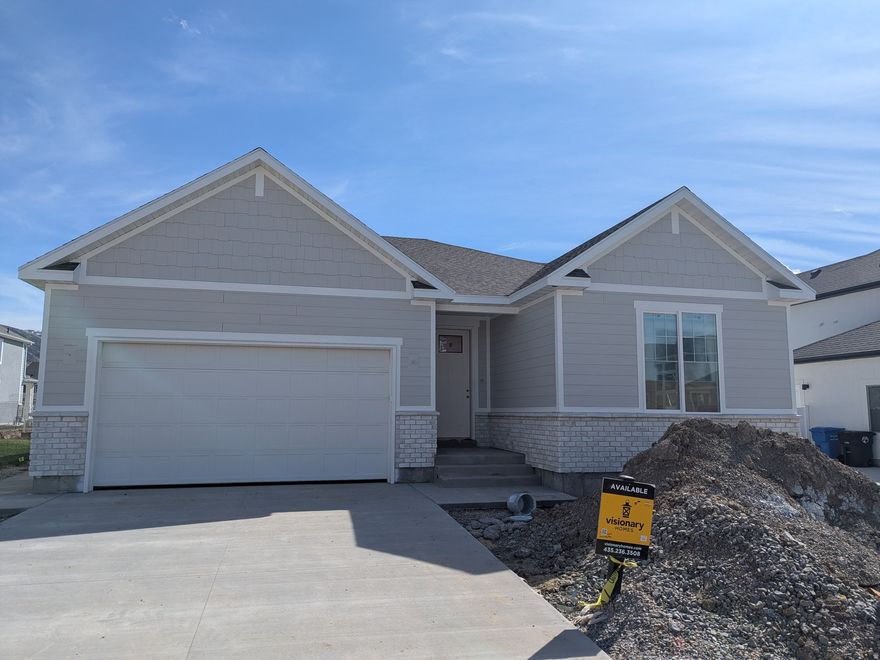 Currently under construction. Our Stunning Auburn floorplan with premium upgrades throughout! Features 9' main floor ceilings and an open-concept layout with a sophisticated design and modern gold accents package. Enjoy a spacious and open kitchen with large pantry and extended dining area. Our top of the line, spa-like primary suite with deep soaker tub and walk in shower and double vanity. Highlights include 8' entry door, TV bundle enhancement and 8x8 ft patio door. Modern and functional! Estimated completion is Mid April 2026.