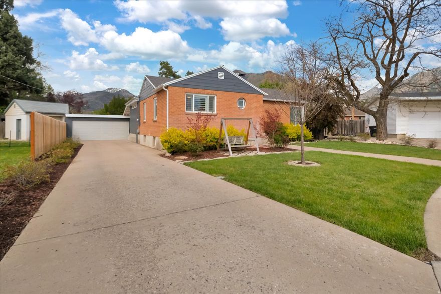 Schedule your tour today to check out this updated Hillcrest home! Thoughtfully refreshed inside and out, this four-bed, two-bath home offers modern comfort and timeless appeal and a beautiful landscape.Inside you'll enjoy light filled living and large entertaining spaces featuring newer windows clad in pretty plantation shutters, an updated kitchen, recently refinished hardwood floors and plenty of built-ins for storage. Outdoors, the large, two-car detached garage is a rare find in the area offering ample space for parking and storage with bonus storage in the cement-floored crawlspace under the house. Plus a covered patio with a built-in fireplace right in your own backyard! This one is sure to go quickly!  Buyer to verify all information.