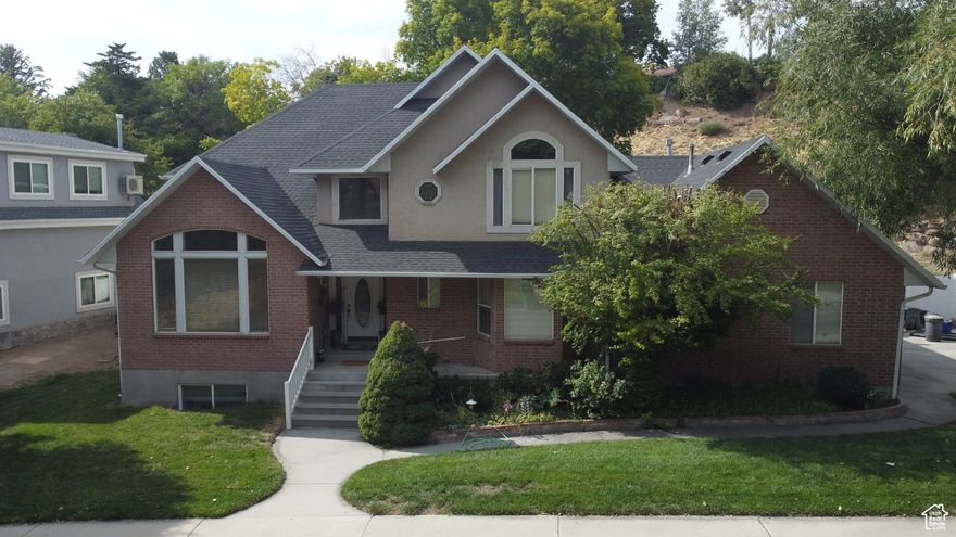 BEAUTIFUL  AREA TO LIVE*EXCEPTIONAL LOCATION BY UVU & SHOPPING*QUIET STREET*WITH A BIG YARD*WELL MAINTAINED HOME* 5 BEDROOMS, (4 BEDROOMS HAVE WIC)*4 BATH* VAULTED CEILINGS IN LIVING ROOM, AND ALL 3 BEDROOMS UP STAIRS*3 CAR GARAGE* 2 FURNACE & AC UNITS*GREAT SPACE FOR RELAXING & ENTERTAINING WITH PEACEFUL SURROUNDINGS*NEW ROOF,PAINT,CARPET*1 FURNACE AND AC ARE 5 YEARS OLD*LG. DECK FOR ENTERTAINING*SPACE FOR KITCHEN WITH WATER AND DRAIN HOOK UP'S IN BASEMENT FOR MIL APT.*FIBER INTERNET AVAILABLE*Parcel # 41-298-0003 IS INCLUDED IN THIS SALE*MAKE YOUR MEMORIES IN THIS HOME