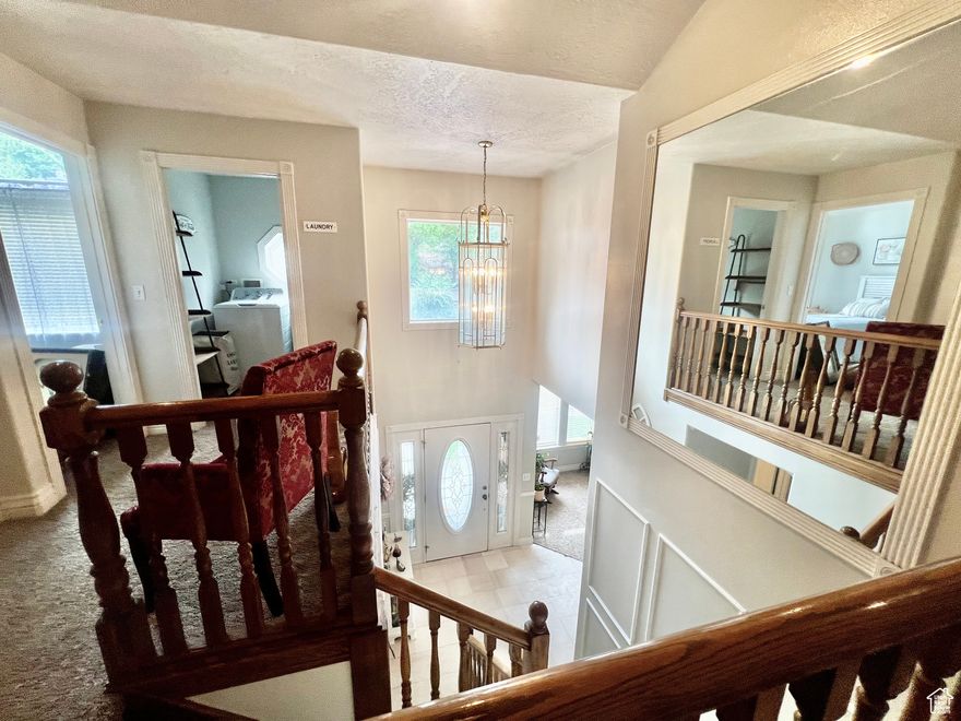 CALL OR TEXT AGENT FOR SHOWINGS***SELLER WILL PAY $15,000 TO BUY DOWN THE INTEREST RATE OR TO CLOSING COST!!! ***BEAUTIFUL  AREA TO LIVE*EXCEPTIONAL LOCATION BY UVU & SHOPPING*QUIET STREET*WITH A BIG YARD*WELL MAINTAINED HOME* 5 BEDROOMS, (4 BEDROOMS HAVE WIC)*4 BATH* VAULTED CEILINGS IN LIVING ROOM, AND ALL 3 BEDROOMS UP STAIRS*3 CAR GARAGE* 2 FURNACE & AC UNITS*GREAT SPACE FOR RELAXING & ENTERTAINING WITH PEACEFUL SURROUNDINGS*NEW ROOF,PAINT,CARPET*1 FURNACE AND AC ARE 5 YEARS OLD*LG. DECK FOR ENTERTAINING*SPACE FOR KITCHEN WITH WATER AND DRAIN HOOK UP'S IN BASEMENT FOR MIL APT.*FIBER INTERNET AVAILABLE*Parcel # 41-298-0003 IS INCLUDED IN THIS SALE*MAKE YOUR MEMORIES IN THIS HOME