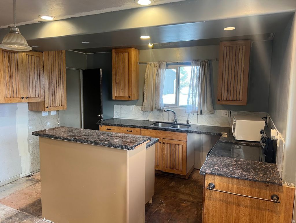 Photo of 3062 HADLEY CT, West Valley City, UT 84128 (MLS # 2142311)