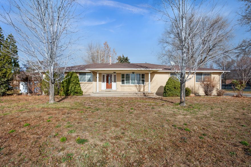 Beautifully maintained 5-bedroom, 3-bath home located on a 1/2 acre corner lot in Syracuse. This spacious property features an open-concept layout with a bright living room, modern kitchen, and a large dining area perfect for entertaining. Many recent updates have been done, including remodeled bathrooms.  Enjoy a fully fenced backyard with a patio and mountain views, plus an attached 2-car garage. There is a fishing pond across the street, as well as a jogging/bike path.  Conveniently close to parks, schools, shopping, the soon to be completed Costco, and Hill Air Force Base, this home offers comfort, style, and a prime location.