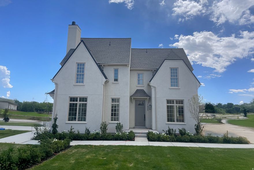 Great End-of-Year Incentive! Use the builder's preferred lender, Security National, and receive $5,000 toward closing costs. Welcome to this charming townhome in Camden Commons, a Goodboro Community located on the northern edge of Herriman. Inspired by London's garden suburbs, this English-style hamlet is thoughtfully designed around a shared green space and features beautiful architecture by Bradford R. Houston Design Studios. Inside, the home offers 3 upstairs bedrooms, including a deluxe primary suite with custom cabinetry, quartz countertops, and distinctive hardware. The main floor showcases a spacious kitchen with high-end finishes and a generous dining space, perfect for everyday living or entertaining. Option for a small private fenced backyard. Camden Commons is ideally situated near shopping, restaurants, and schools. Private showings available-call today!