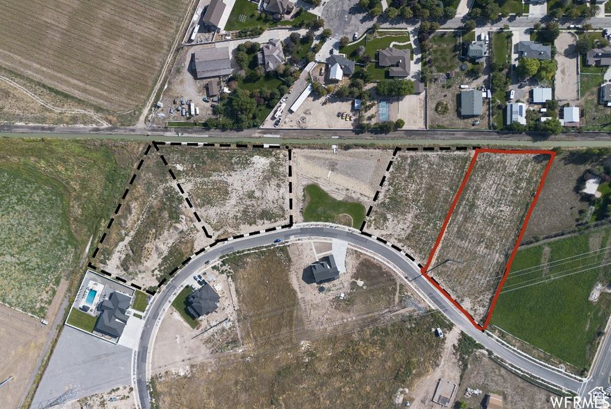 Discover one of the last remaining lots in the exclusive Vista Meadows community! This luxurious neighborhood in Bluffdale boasts stunning backyard views of the Wasatch Mountains and convenient access to I-15 Bangerter Highway & Mountain View Corridor. With over 1.7 acres (Lot #21) at your disposal, the possibilities for designing your dream home are limitless. Don't miss this exceptional opportunity to create your ideal retreat in a breathtaking setting!