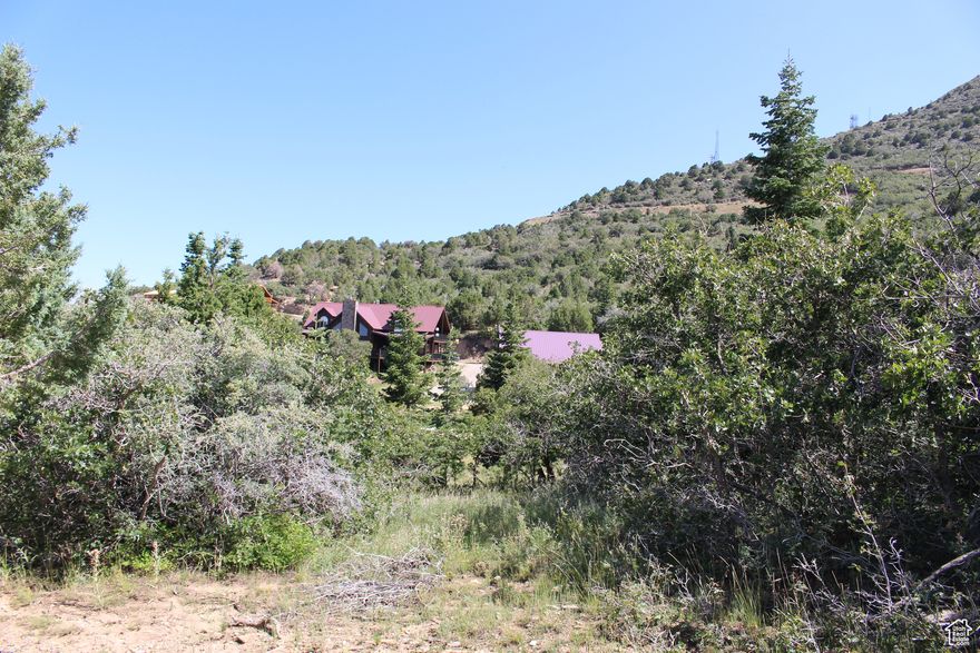 Fantastic building lot in Cedar Highlands. This lot sits up high toward the eastern part of the subdivision. Build site can be accessed from the east or west boundary of the lot. Great views and surroundings. Seller is a licensed contractor and will build to suit. He has several Cabin style home plans to choose from. The price reflected on listing is only for the lot. Seller financing available.