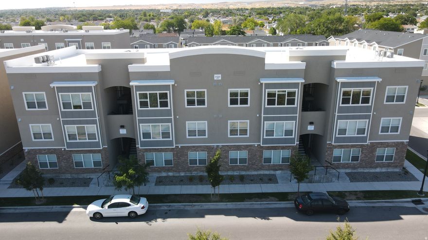 Built in 2020, this 20-unit asset at 7337 W Louden Grove Drive offers a "turn-key" investment in the high-growth Salt Lake Valley. The property features an exceptional unit mix of 16 expansive 1-bed/1-bath units (902 sq ft) and 4 oversized 2-bed/1-bath units (1,322 sq ft), providing significantly more living space than the market average to attract hard working, long-term tenants. Situated just 15 minutes from Downtown SLC with immediate access to the Hwy 201 corridor, this low-maintenance building combines modern construction with the lifestyle amenities of the Colony Farms community, representing a premier opportunity for long-term appreciation in Utah's strongest rental submarket.
