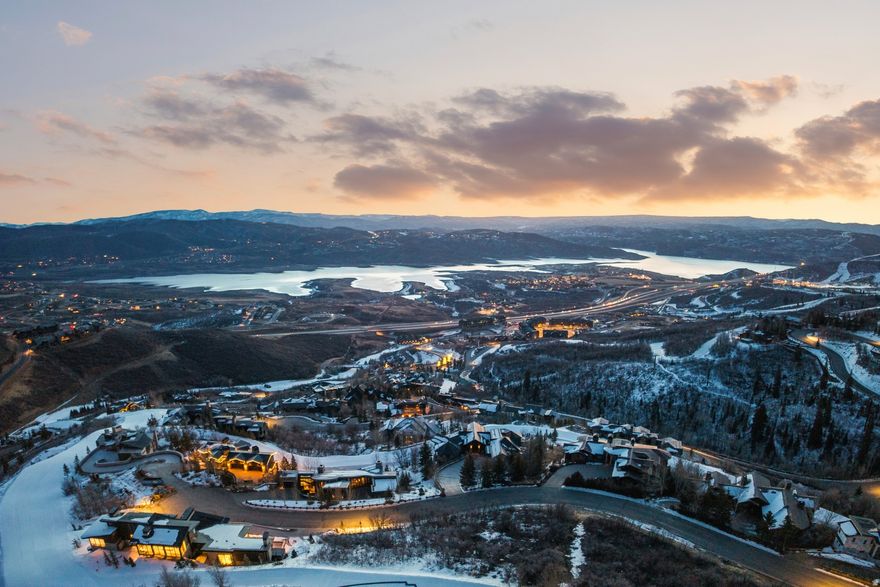 A truly exceptional opportunity awaits behind the private gates of Deer Crest. Perfectly nestled at the end of a peaceful cul-de-sac, this rare ski-in/ski-out lot captures breathtaking, panoramic views of snow-draped mountains and the sparkling Jordanelle Reservoir. With direct access to the coveted Jordanelle ski run leading to both the Deer Valley Gondola and Mountaineer Lift, your connection to world-class skiing is effortless. In the warmer months, endless adventure awaits with private access to scenic hiking and biking trails, and the convenience of boating, fishing, and water sports just minutes away via the Deer Crest back gate. Stroll to the iconic St. Regis Hotel and enjoy effortless access to the vibrant new Mayflower Village, Highway 40, and the charming towns of Midway and Heber. Design and build your dream mountain estate on this irreplaceable homesite-where year-round adventure, breathtaking views, and unmatched privacy come together in one of Deer Valley's most sought-after locations.