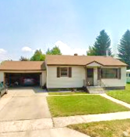 Charming Bungalow/Cottage Move-In Ready!  Discover the best of Soda Springs living in this delightful 1952 bungalow/cottage, offering 816 sq. ft. per floor with a main level and full basement (1,632 sq. ft. total). Thoughtfully updated, this home blends vintage charm with modern comforts. Features Include: New garage doors, central air, water softener, refrigerator, toilet, attic insulation, and rain gutters. Cozy & Functional, gleaming hardwood floors, built-ins, a wood-burning stove, and a spacious kitchen with oak  cabinets and gas oven/range.  Outdoor oasis on .22-acre lot with mature trees, sprinkler system, open porch, and patio  perfect for cookouts and relaxation. Prime Location, nestled in a lovely, low-traffic neighborhood with friendly neighbors and a true sense of community. Additional Perks:  All city utilities;Taxes reduced by 40% with owner-occupied "homeowners exemption" estimated at $1272 or occupied investor at $2119.  Qualifies for USDA, IFHA no-money-down, and assistance loan programs.  Embrace the Soda Springs lifestyle in this well-maintained gem!