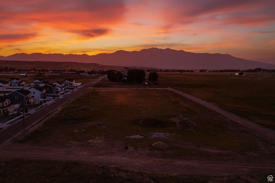 Welcome to the Sunset Fields Subdivision! Located on the South End of beautiful Hyrum, UT these lots have views of multiple mountain ranges giving you the most amazing sunsets. Bring your own Builder or use our preferred builder and create your dream home in your dream location! Lots are pending final approval, bonding, and recording. Estimated delivery November 2025.