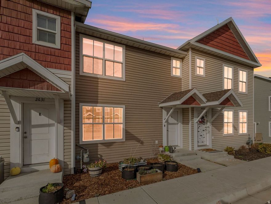 1,248 Sq. Ft. Centrally Located Townhome + 600 Sq. Ft. Bonus Space.  Don't miss this affordable, well-maintained townhome featuring a spacious master suite with a walk-in closet and private bath. Fresh new carpet throughout, and all appliances stay - including the fridge and stackable washer & dryer. Two dedicated parking spaces included!  Conveniently located near Hill AFB, I-15, I-84, HWY-89, shopping, and parks. Enjoy a private deck overlooking a large community green space. This rare unit also includes a 20' x 30' (approx. 600 sq. ft.) lockable storage area beneath the home - tall enough to stand in (up to 6'3