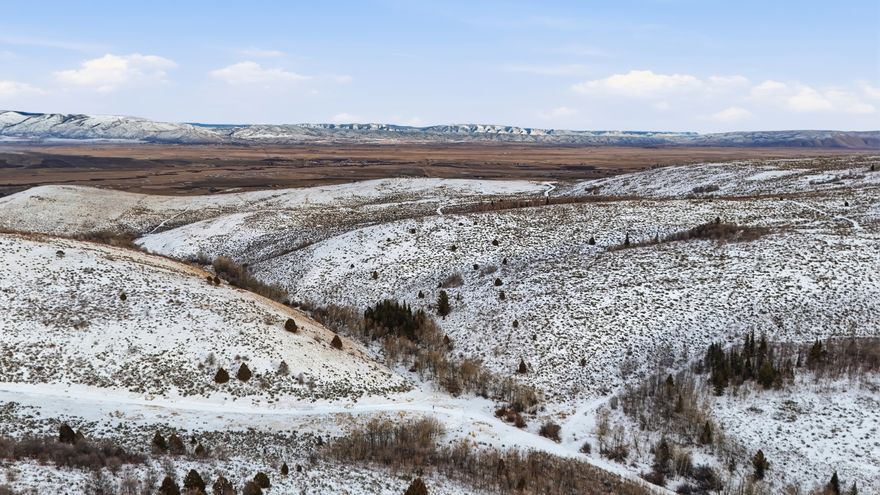 Bring your rural vision to life on this beautiful 39.44-acre property in Bear Lake County, Idaho. Wide- open space, crisp mountain air, and unobstructed views surround a sturdy hay-cover pole barn ready for equipment, livestock, or storage. The acreage offers gentle rolling terrain and easy year-round access-perfect for farming. Wildlife, serenity, and clear night skies define this area, while you're still within convenient distance of Montpelier and Bear Lake's recreation. If you've been searching for a private slice of Idaho with usable land and stunning vistas, this one checks every box.