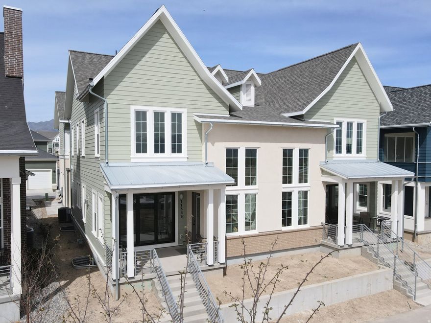 3% Preferred Lender incentive! Move-In Ready, Stunning Waterfront Home with Rentable ADU (apartment above the garage) and Spacious 3-Car Garage. Discover the perfect blend of versatility, comfort, and waterfront living with the brand-new Birmingham floorplan. This thoughtfully designed home offers an expansive layout, ideal for modern living and entertaining. The main living area is crafted for seamless indoor/outdoor living, featuring sliding doors that open to a spacious porch for enjoying the views along the waterfront. For those who love to cook, the home includes a large walk-in pantry, offering plenty of storage. The Primary bedroom features an upper deck with a pergola, providing a serene retreat. The standout feature of the Birmingham plan is the attached Accessory Dwelling Unit (ADU), offering endless possibilities-whether it's for rental income, a dedicated guest suite, or an extended living space. List price is a FINISHED ADU, along with the premium waterfront lot and designer upgrades and options!