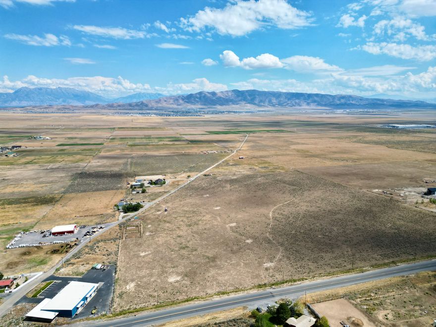Horse Property with a beautiful view of the Oquirrh Mountains and Cedar Valley. No HOA. No CC&R. Bring your own builder and build your dream home. Fiber, Power, and Water are stubbed to the property.
