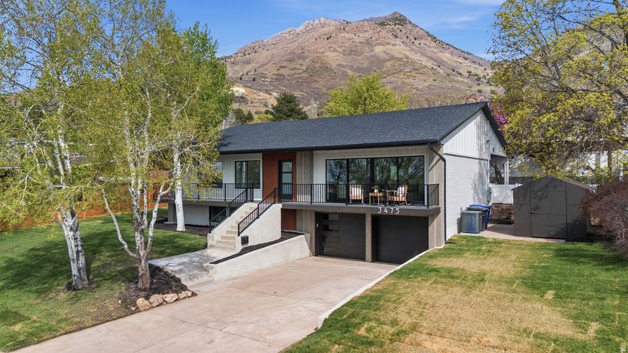 This fully remodeled home is in one of the most sought-after East Bench neighborhoods in Salt Lake City. Vaulted ceilings and expansive windows create a bright, open feel. The home's layout is thoughtful throughout- Featuring a private wing for the primary suite, a theater room with a bar, and a secluded backyard with sweeping mountain views. Well-positioned near trails and downtown. Square footage figures are provided as a courtesy estimate only and were obtained from Floor Plans.  Buyer is advised to obtain an independent measurement.