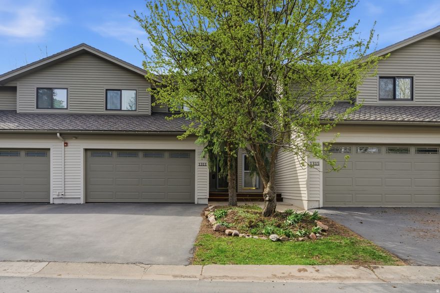 Darling updated Silver Springs townhome near trails, schools, and all things Park City. This beautifully maintained townhome is ideally located in the Ptarmigan neighborhood of Park City's much sought after Silver Springs, just off Rt 224, and set close to the Willow Creek Trail System, neighborhood parks, tennis courts, Parley's Park elementary school, and Kimball Junction with easy access to I-80 as well as all three major ski areas. This small community is one of a very few to offer its own pool for residents. The townhome offers a flexible layout suited for either full time living or a mountain get away. An open floorplan with full remodeled kitchen and bathrooms including custom cabinetry and and granite countertops throughout, and generous storage. With energy  efficiency in mind, all windows and sliding doors were replaced in 2022. A spacious finished lower level, rarely found in Park City, offers flexible space for an office, home gym, media center and/or guest quarters, complete with a queen sized Murphy cabinet bed and a full bath plus a laundry room, utility  room, and under stairs storage closet. An interior unit with modest utility costs, its cathedral ceiling and expansive windows enable it to "live large", while its rear deck and lawn provide both a sense of privacy and easy access to the outdoors. A two-car garage, plenty of storage, and furnishings available for purchase add to the home's convenience and turnkey potential.