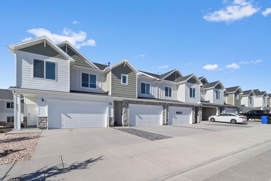 Experience the Oak floor plan in the highly sought-after Village at Fox Meadows community! This thoughtfully designed 2-story townhome offers an open-concept main floor perfect for entertaining, relaxing, and everyday living, with intentional use of space throughout. Upstairs, you'll find 3 spacious bedrooms, including a private primary suite, along with 2 full bathrooms and convenient second-floor laundry. Enjoy the ease of brand-new construction paired with modern finishes, abundant natural light, and an attached 2-car garage. Village at Fox Meadows is designed for lifestyle and connection, featuring nearby parks, walking paths, pool and pool house, and open green space, with quick access to everything Smithfield has to offer while still maintaining that peaceful neighborhood feel. Skip the projects, the maintenance, and the compromises - and step into a brand-new home backed by a builder's warranty today!  **Photos are of a similar home and not the exact unit.