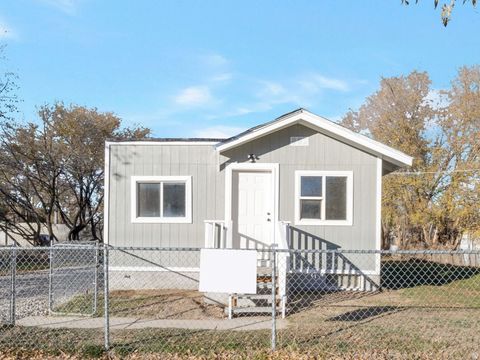 Photo of 1680 W CLAYBOURNE AVE N, West Valley City, UT 84119 (MLS # 2124640)