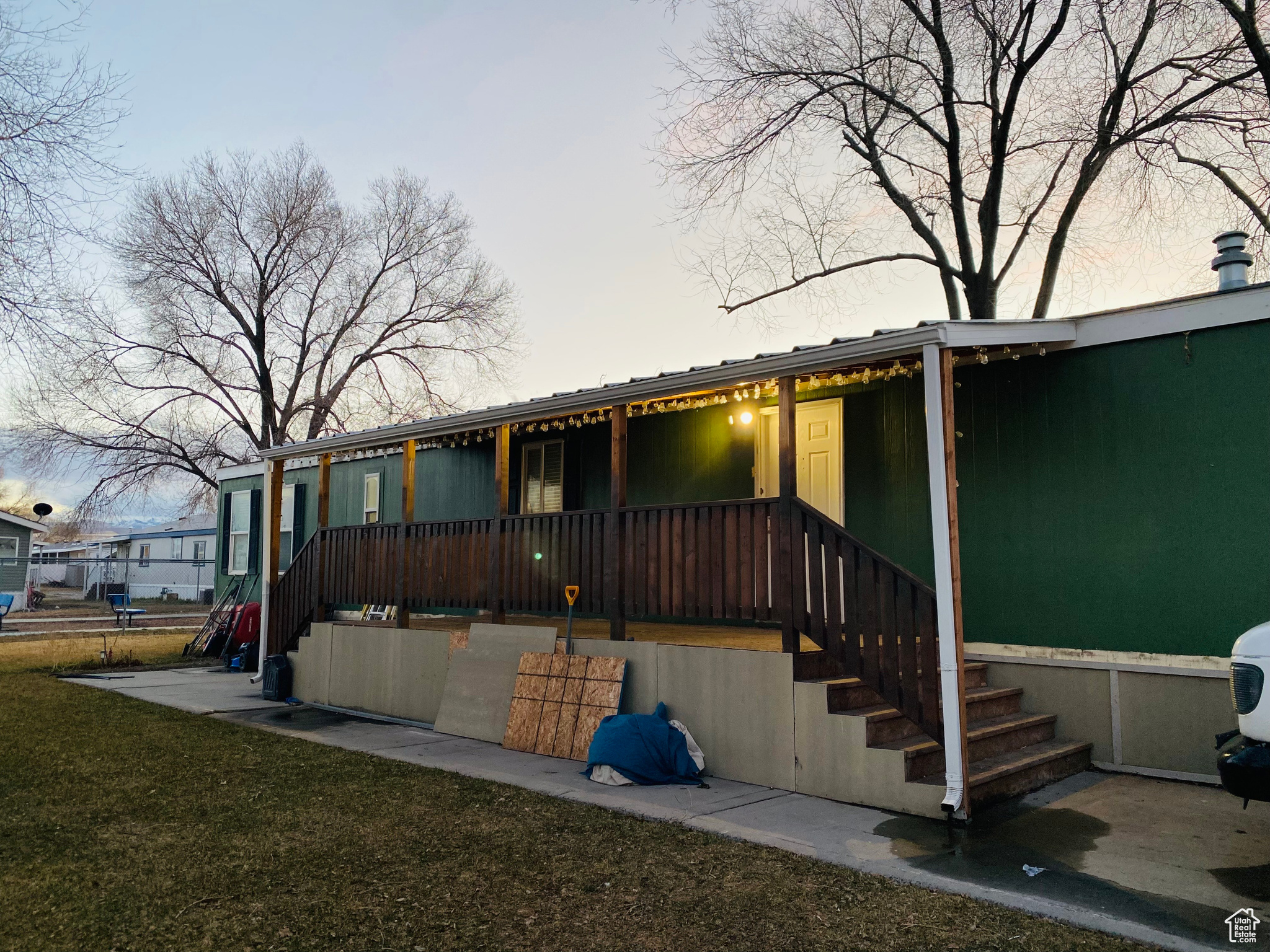 The mobile home is newly remodeled, with new paint, flooring, light fixtures, bathroom vanities, and baseboards. This property includes a washer, dryer, stove, and fridge.  The roof was changed in 2019, the water heater in 2023, the furnace and A/C in 2022, hardwood cabinets throughout the kitchen, the exterior paint from 2023, and the windows in 2020. This property has a sprinkler system and a well take-care yard.