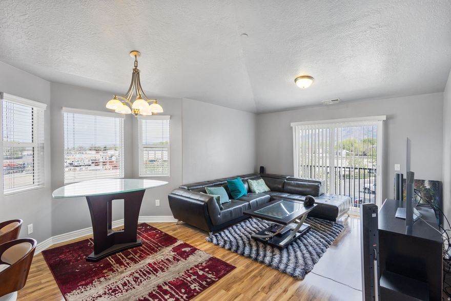 Welcome to this well maintained, top-floor condo in the East Town Village community. This home offers vaulted ceilings and a private balcony where you can soak in the views of the Wasatch Mountains. The en-suite bathroom and walk-in closet in the primary bedroom creates a functional space for the new owners. Close to parks, schools, shopping, entertainment, TRAX and freeway. Square footage figures are provided as a courtesy estimate only and were obtained from County Records. Buyer is advised to obtain an independent measurement.
