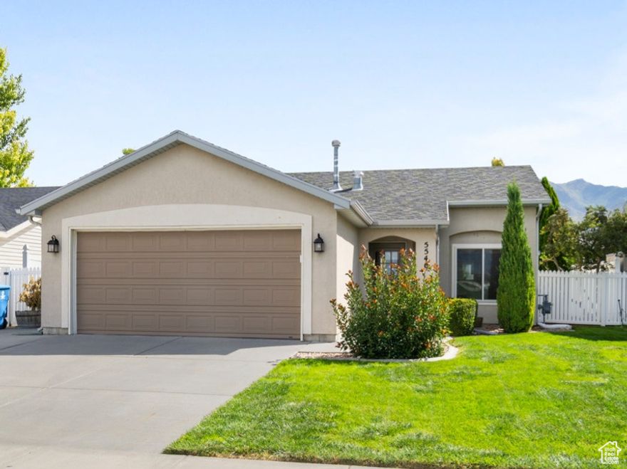 Perfect Location! This lovely Rambler is ideally located directly across from the large neighborhood park with gorgeous mountain views. Freshly painted from top to bottom this home is clean and move-in ready.  The enclosed sunroom offers extra living space and a year round views of the beautiful, fully fenced yard. Main floor living makes this home perfect for anyone. Great access to freeways and only 20 min to SLC - come and see!
