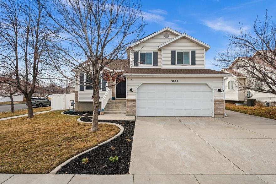 Welcome to this thoughtfully updated corner-lot home in Salt Lake City. With solar panels, dedicated RV parking, and versatile living space, it offers efficiency, flexibility, long-term value, and affordability. The main level flows seamlessly between kitchen, dining, and gathering areas, creating a layout that feels open yet comfortable. Stainless steel appliances, generous cabinetry, and ample prep space anchor the kitchen for both daily living and easy entertaining. Upstairs, the primary suite includes a private ensuite bath. Additional bedrooms adapt easily for guests, workspace, or growing needs. The finished basement expands the home's functionality and is stubbed for a future bathroom (equity potential!) The fully fenced backyard is designed for enjoyment, featuring garden boxes, open lawn space, and a covered gazebo ideal for summer evenings. The corner setting enhances both privacy and curb appeal. Walk to Oquirrh Park and multiple neighborhood parks for pet lovers and needed playground time. Minutes from the Utah Olympic Oval, Utah First Credit Union Amphitheatre, The Ridge Golf Course, shopping, dining, and commuter access. This home checks all the boxes...and then some!