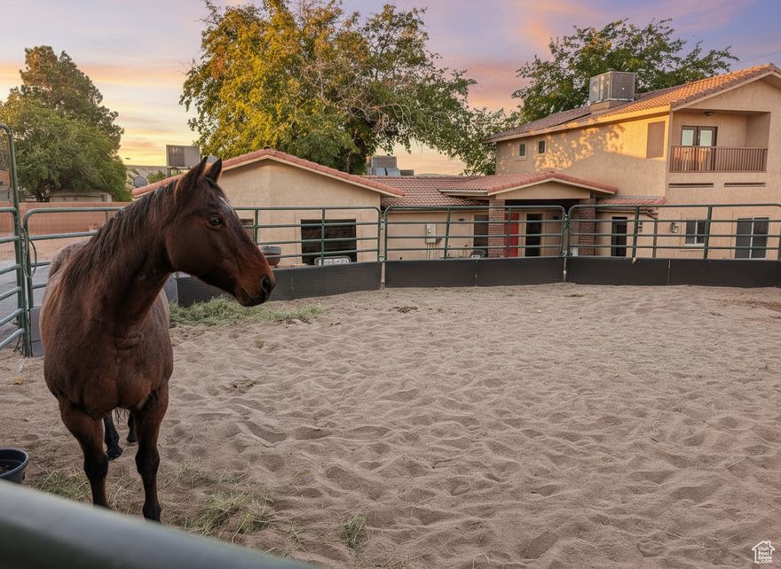 Horse Haven Ranch is an equestrian's utopia! This turnkey abode has flourished as a horse B&B under its current owners, who crafted an immaculate and peaceful equine sanctuary. Every detail of the property reflects thoughtful enhancements. The premier 15' raised center aisle barn, 2160 sf, boasts approximately $100,000 in bespoke upgrades, including world-class Stable Comfort (like WEC) orthopedic flooring (no need for shavings!) cooling misters, high-efficiency fans, awnings, shades, and a swamp cooler for those warm summer days. Illuminated stalls, a hot/cold wash bay, a bathroom, and Prodex insulation elevate the barn's functionality and charm. In the 38-foot round pen and 20x24 runs, the footing is pristine washed sand. The newly constructed garage (2022), crafted by Mancave, features 10-foot doors and an elevated ceiling height. The 2025 carport is also by Mancave. For your canine friends, a dedicated, fully enclosed dog retreat boasts a generous shaded patio and premium, professionally installed turf-a $20,000 enhancement.  The 2700 sf, four-bedroom, two-bath residence is graced with beautiful appointments, a gourmet kitchen with a professional-grade refrigerator and freezer, stainless appliances, and granite counters, custom cabinetry, solid wood doors throughout the home, a luxurious primary suite, all with serene views over the horses or to the red-rocked mountains beyond. The second primary suite, on the main level, is straight out of a magazine!  With its private entrance, dedicated office, gorgeous kitchenette, hardwood floors, and cowboy curated finishes, it's the quintessential retreat for in-laws or guests. Nestled in a vibrant equestrian community, Horse Haven Ranch is a short ride from some of the best trails: Snow Canyon, Rim Trail, Turtle Wall, Chuckwalla, and other trail loops. This ranch's meticulous, low maintenance design means more time in the saddle! Owners recently converted the property to sewer. All information and measurements are provided as a courtesy; buyers should verify all measurements and zoning.