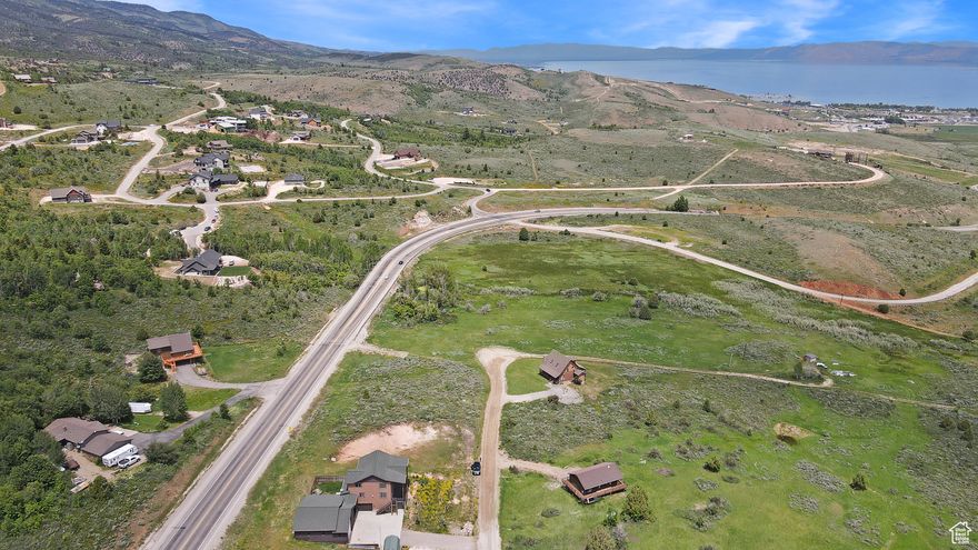 Flat, ready-to-build lot with sweeping Bear Lake views in a location that makes every season count. Just minutes from downtown Garden City, you'll enjoy quick access to the marina, local dining, shopping, and the bike and walking trail. Outdoor recreation is right at your fingertips-from boating and paddleboarding in the summer to snowmobiling and skiing at nearby Beaver Mountain (approx. 15 minutes). Water and power are already stubbed, giving you a strong head start on building. Easy highway access offers convenience without sacrificing the peaceful setting. Septic system required (to be installed by buyer). Motivated seller-bring your offer. Buyer and buyer's agent to verify all information.