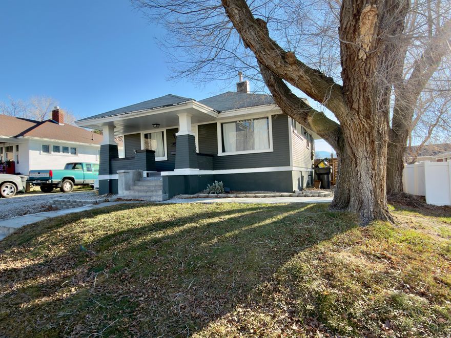 Charming Brigham City bungalow with main level living and a full mother-in-law apartment! This inviting home offers 2 bedrooms and a full bath on the main level, plus a fully finished basement featuring an additional bedroom, 3/4 bath, second kitchen, and separate entrance. Perfect for multi-generational living, guests, or potential rental flexibility. Newer roof, furnace, HVAC, and water heater as well as many updates throughout the home.