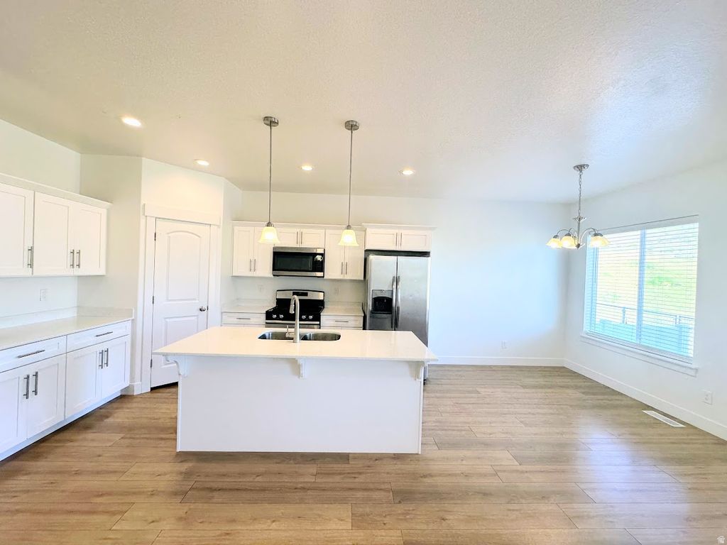 Photo of 16042 S BODMIN WAY #318, Bluffdale, UT 84065 (MLS # 2157186)