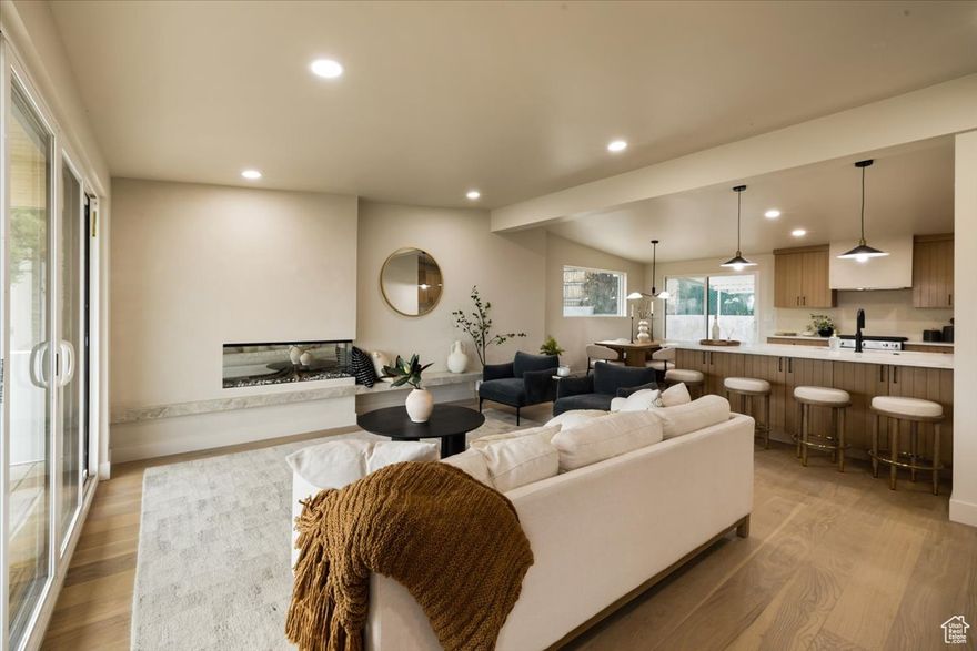 The perfect place for your holiday parties this season! ALL PLASTER IN THE BATHROOMS HAS BEEN REPLACED WITH NEW TILE. Downtown SLC views, amazing floor plan and LUXARY upgrades- this home has it all! Enjoy your own little piece of heaven in a fabulous cul de sac on the east bench of SLC! An open floor plan with exquisite upgrades at every corner. Enjoy waking up in a primary suite that feels like a sanctuary overlooking the valley and then walking into your personal spa to prepare for the day! Do not overlook the heated floors! The upper level has an additional 2 bedrooms, full bath and laundry room. Down stairs enjoy an additional entertaining space and the perfect place to take advantage of some indoor/outdoor living! On the lower level there is an an additional bedroom or office space as well as another full bathroom. Buyers are sure to enjoy the 2 CAR GARAGE, storage and fantastic backyard!  BUYER/BUYERS AGENT TO VERIFY ALL INFORMATION.