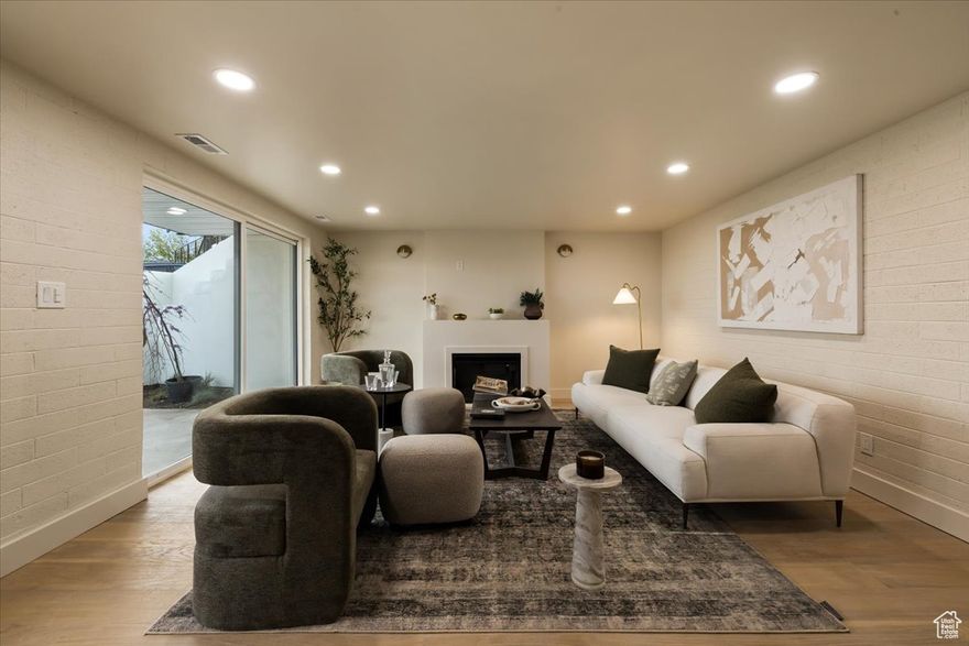 The perfect place for your holiday parties this season! ALL PLASTER IN THE BATHROOMS HAS BEEN REPLACED WITH NEW TILE. Downtown SLC views, amazing floor plan and LUXARY upgrades- this home has it all! Enjoy your own little piece of heaven in a fabulous cul de sac on the east bench of SLC! An open floor plan with exquisite upgrades at every corner. Enjoy waking up in a primary suite that feels like a sanctuary overlooking the valley and then walking into your personal spa to prepare for the day! Do not overlook the heated floors! The upper level has an additional 2 bedrooms, full bath and laundry room. Down stairs enjoy an additional entertaining space and the perfect place to take advantage of some indoor/outdoor living! On the lower level there is an an additional bedroom or office space as well as another full bathroom. Buyers are sure to enjoy the 2 CAR GARAGE, storage and fantastic backyard!  BUYER/BUYERS AGENT TO VERIFY ALL INFORMATION.