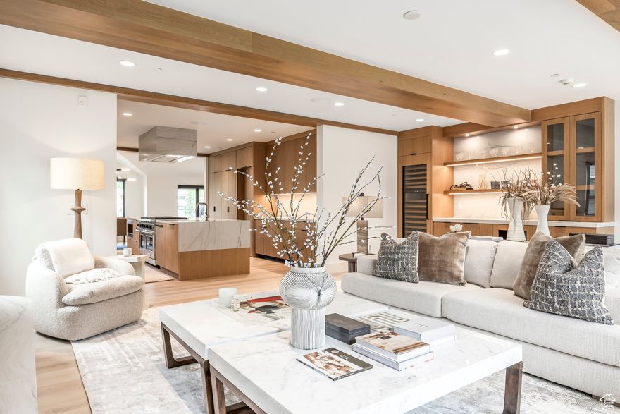 Presenting the Crown Jewel of the Lilac Hill subdivision. Perfectly positioned between Historic Main Street and Deer Valley Resort, this brand-new, contemporary masterpiece blends architectural brilliance with mountain elegance. Designed by acclaimed architect Jonathan DeGray, crafted by Aerie Construction, with interior design and furnishings by Melissa Matherly with Alder & Tweed, this 5,098 sq. ft. residence is a true elegant mountain retreat. With five bedrooms, six bathrooms, and spacious entertaining areas, the home offers seamless flow for gatherings, both large and intimate. The spacious dream kitchen is always the heart of the home and will accommodate all your assistant chefs during the holiday gatherings. It is outfitted with a full Wolf, Sub-Zero, and Cove appliance suite, spacious pantry, and is complemented by clean lines and exquisite finishes.  South-facing walls of glass open to the expansive exterior deck, providing beautiful and effortless indoor-outdoor living. Every detail has been carefully curated-from the spacious entertaining areas, stylish office space, convenient elevator access to all floors with 5 luxurious bedroom suites-making this home as functional as it is stunning. Ready for immediate enjoyment, this Park City Deer Valley dream home is fully finished and furnished, just in time for the 2025/2026 ski season. Located on the free Park City bus route and is just a delightful short walk to Main Street and Deer Valley Resort.