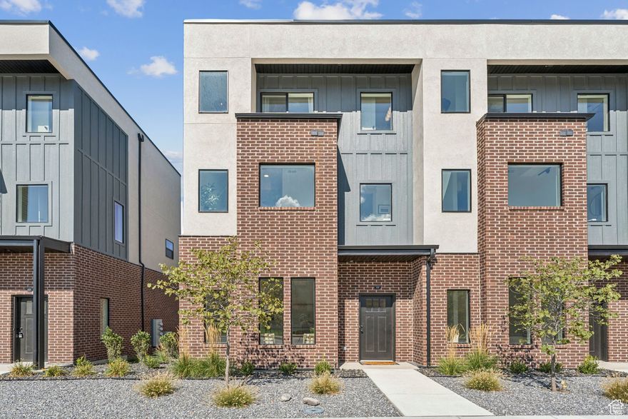**Ask about our AMAZING preferred lender incentives!**  Welcome to Bountiful's newest 2-bedroom townhomes on historic Main Street - a setting so charming, it's been featured in Hallmark movies! Each townhome offers an attached 2-car garage, two spacious bedrooms with ensuite baths, a flex space on the first floor (perfect for an office or gym) and a modern, open kitchen perfect for entertaining. Enjoy your private balcony-ideal for grilling or taking in views of the mountains and Main Street! Just 15 minutes to Salt Lake City and about 30 minutes to Park City's ski slopes, festivals, and mountain trails! Easy freeway access and walkability to local shops and dining. Whether you're looking for a low-maintenance lifestyle, an investment property, or a lock-and-leave home near it all, these townhomes combine small-town charm with big-city convenience. Schedule your tour today! All townhomes are move-in ready!