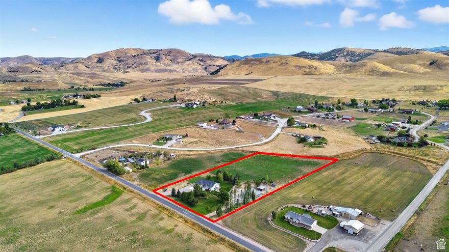 Many possibilities present themselves as you pull up to this one owner, west facing rambler in a desirable location. Will it be the 3.9 acres setup with pressurized irrigation, the 1,000 sqft  quonset hut building & a 320 sqft pole structure, the 3 car garage, the private backyard, or the generous size of the home that will bring you a smile... maybe all the above? This home has a spacious layout that was just professionally cleaned. The bright open kitchen includes a large island and corner sink to view the rolling hills that are a backdrop to the backyard. This leads to the mud room and garage or over to the dining area and living space upgraded with a gas fireplace to enjoy cozy winter nights. Generous primary suite roomy enough for a reading nook retreat. Lower level has a finished space setup as a recreation room that could be a dedicated lounge area with entertaining features such as a pool table, or a media room to emphasize entertainment and social gathering.  This all leads to unfinished space open to your vision such as additional bedrooms, flex space for office and/or exercise room, etc.  The walkout leads to the quonset hut updated with power and the many mature fruit trees. ***Carpets were original to home and worn. Sellers removed so Buyer could select a carpet of their choice.  Sellers are offering a carpet allowance to finish off the upstairs space in your taste.