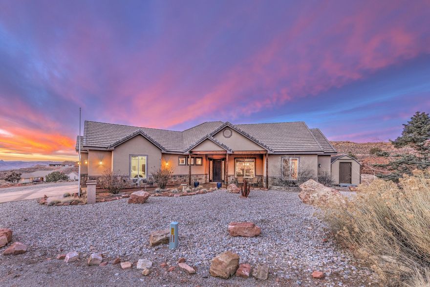 Elevated Moab Living with Unmatched Views  Welcome to this stunning 2,282 sq. ft. home offering the perfect blend of comfort, style, and scenery. Elevated to capture breathtaking views of the La Sal Mountains, sweeping valley vistas, and Moab's iconic red rocks, this 3-bedroom, 2.5-bath residence is designed to impress.  Inside, abundant natural light fills the open living spaces, anchored by a striking two-sided fireplace that adds warmth and ambiance to both living and dining areas. The chef's kitchen is ideal for entertaining, featuring generous workspace, quality finishes, and seamless flow to the main living areas.  Step outside to exceptional outdoor living spaces-perfect for relaxing, dining, or soaking in the views year-round.  The patio offers built-in BBQ grill, outside smaller refrigerator, and beautiful rock fireplace. The nicely sized backyard offers privacy and room to enjoy Moab's outdoor lifestyle.  All of this is just minutes from downtown Moab, providing easy access to dining, shopping, and recreation while still enjoying a peaceful, elevated setting. This is Moab living at its finest-views, location, and livability all in one exceptional home.  There is potential to subdivide in this zone, with a one acre minimum.