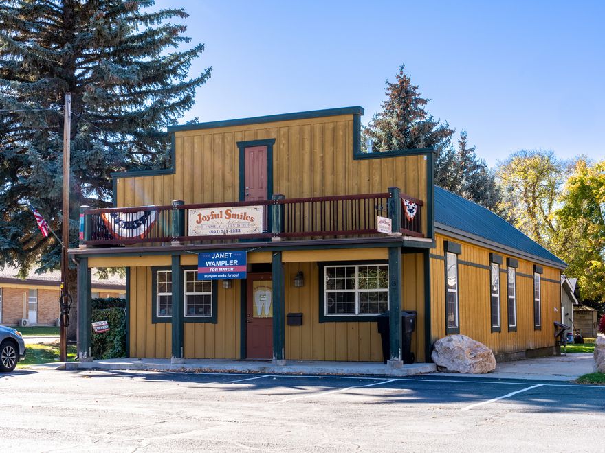 The Square is a rare mixed-use opportunity in the heart of Huntsville, Utah where Main Street visibility meets year-round mountain-town demand. Available as three distinct properties or as one complete transaction, this legacy package is zoned C-1, offering flexible use potential across multiple buildings and parcels-just minutes from the outdoor recreation Ogden Valley is known for, including Snowbasin, Pineview Reservoir, and endless hiking, biking, and alpine access. Sold together, are the 1,456 SF commercial building, (MLS#2134567, currently leased to a long-term dental practice) 1,058 SF single-family home (MLS#2134566) featuring 2 beds and 1 bath on 0.02 acres, and the 966 SF event barn. All three share a large grassy common area adorned with charming sheds and small-town character-ideal for gatherings, weddings, and community events. If your dream is to own a restaurant in a Rockwell-esque setting, pinch yourself-you found it! The 1,836 SF restaurant (MLS#2134565) includes a turnkey equipment package with prep sinks, a 6' x 6' walk-in refrigerator, an ice cream freezer, stainless steel prep tables, a 6-burner range with oven, a 48-inch charbroiler grill, and more. In a town where recreation isn't a season-it's the infrastructure-this location is positioned to serve a constant rotation of locals, visitors, and outdoor crews. Nearby, Gold Rush (MLS#2134564), zoned C-1, offers approximately 2,448 SF on 0.19 acres with flexible potential for retail, service, or mixed commercial use. This represents rare in-town commercial inventory with visibility and placement that's increasingly hard to replicate in Ogden Valley. Together, with historic character, a walkable setting, and a multi-building layout, The Square in Huntsville, UT is positioned for entrepreneurs and investors seeking a flagship footprint in the heart of the Wasatch. As Snowbasin ramps toward the 2034 Olympics and Powder Mountain continues its evolution, now is the time to secure a true Main Street position in one of Northern Utah's most recreation-driven ski-town communities. Buyer to verify all