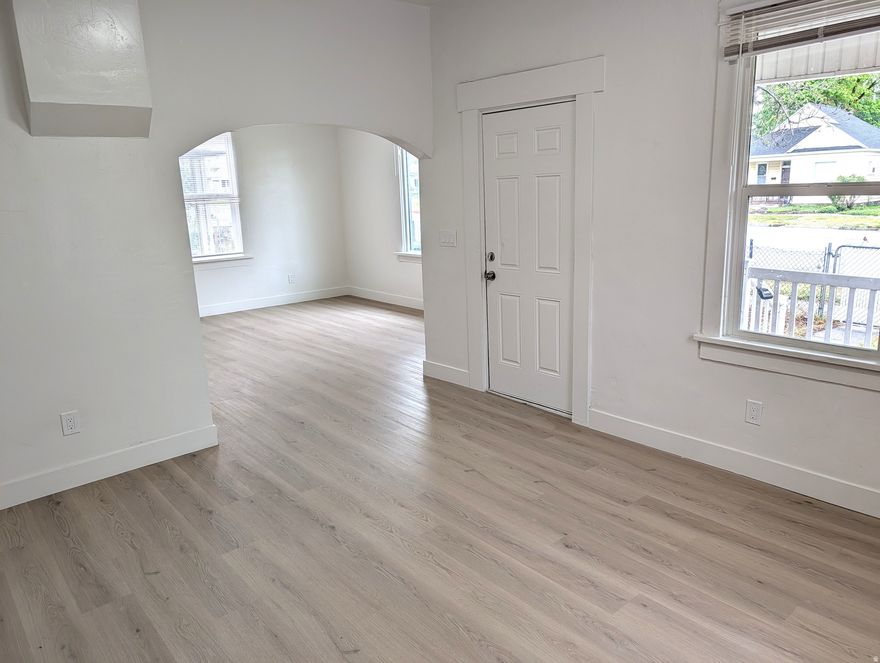 Beautifully updated and move-in ready! This home is filled with natural light thanks to soaring ceilings and large windows that create an open, and inviting feel.  Thoughtful updates include new LVP flooring, plush carpet, and fresh interior paint throughout. The redesigned kitchen features brand-new cabinetry, countertops and updated finishes.  Bathroom is also stylishly updated with new cabinets and modern tub/shower combo.  Clean, contemporary, with a spacious open living room -this home offers the perfect blend of comfort and style.