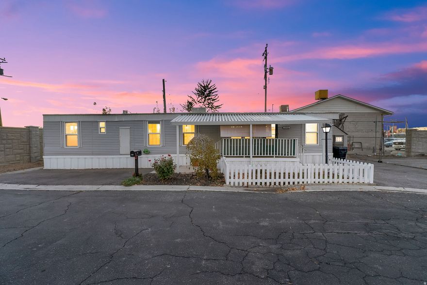 Newly updated mobile home located in South Salt Lake City. Open floor plan has a beautiful kitchen featuring gas range, partial butcher block countertop, backsplash, and updated lighting. Popular 3 bedroom 1 bathroom floor plan. Brand new paint, flooring, and windows throughout. Property is conveniently located near dining, shopping, and entertainment. This is a 55+ community where at least one resident needs to be 55 years old to qualify. Lot rent of $814 includes water, sewer, trash, and gas.