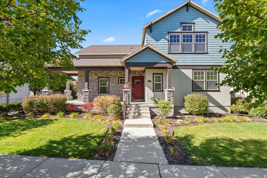 Marvelous combination of design, luxury, and lifestyle in this captivating Daybreak residence. Thoughtfully designed living spaces and inspired decor. Impressive upgrades features upgraded lighting, luxury vinyl flooring and painted wood panels. Gorgeous kitchen boasts quartz counters, striking backsplash and picture window overlooking magnificent, unmatched backyard.  Splendid dining boasts designer chandelier. Luxurious main-level primary suite showcases rich decorator colors, custom wall unit and spa-inspired bath. Upstairs, natural light streams into bright, beautiful bedrooms and includes a dream bonus retreat; perfect for play, work, or relaxation. Inviting lower level offers wonderful entertainment spaces, theatre room, guest suite and abundant storage.  Spectacular yard is amazing outdoor oasis with deck, patio, paver walkway, fruit trees, play area and more. Steps from Oquirrh Lake and incredible parks.  Daybreak offers complimentary paddleboard, canoe and kayak rentals, free concerts, walking trail around lake, sandy beaches and more.  Vibrant, new Downtown Daybreak offers restaurants, Megaplex entertainment complex and Salt Lake Bees Stadium.  This home offers the perfect backdrop for extraordinary living.