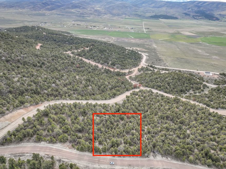 Located in Black Hawk Estates, this lot offers a great opportunity to build in the peaceful hills of Indianola, about 30 minutes from Spanish Fork. The property has culinary water stubbed to the lot and power nearby, making it ready for your future plans. A culinary water connection fee will apply through the water company at the time of hookup. Black Hawk Estates is designed with outdoor recreation in mind and planned amenities include a private swimming lake, ATV and horse trails, beach volleyball, picnic areas, and more. A great option for a weekend retreat or future build site surrounded by open space and fresh mountain air.