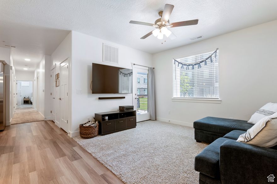 Welcome to this beautiful 3-bedroom, 2-bath main-level condo located in the desirable Timp Point community of Lehi. Built in 2022, this 1,233 sq ft home offers stylish, low-maintenance living with thoughtful finishes throughout. The open-concept layout features a spacious great room, dining area, and a modern kitchen with built-in dishwasher, disposal, gas range, and sleek vinyl flooring. The primary suite includes a walk-in closet and private bath. Enjoy added conveniences like central air, 95%+ efficient gas furnace, and electric dryer hook up.  Relax on your private patio or take advantage of the community's clubhouse, pool, and playground. Attached 1-car garage provides secure parking and storage. Located near shopping, schools, and easy freeway access. HOA  includes maintenance of beautiful common areas. Perfect for first-time buyers, downsizers, or investors-don't miss your chance to own this move-in-readygem! Square footage figures are provided as courtesy estimates only and were obtained from county records. Buyer is advised to obtain an independent measurement.