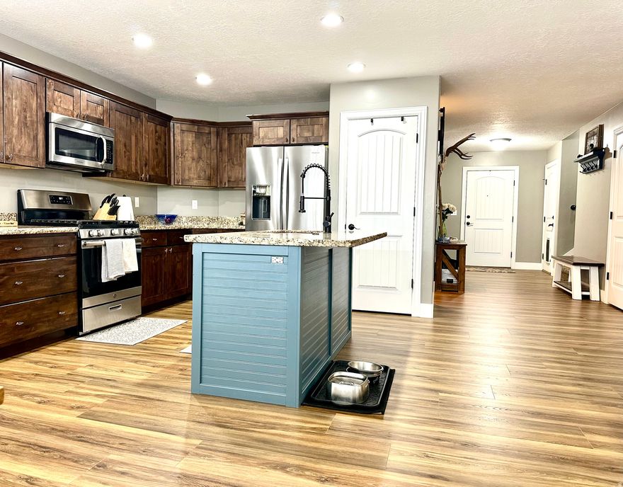 This stunning home is filled with too many upgrades to list and features a magnificent open layout perfect for modern living. The primary bedroom is conveniently located on the main floor and includes all the amenities you could wish for. Enjoy the spacious bonus rooms above the garage, complete with its own A/C and furnace for year-round comfort. Step outside to a fully fenced and landscaped backyard, ideal for relaxing or entertaining. Located in the desirable Lucky Acres Subdivision, this home truly has it all - comfort, style, and thoughtful design in every detail. Don't miss your chance to make this exceptional property your new home! All information is deemed reliable. Buyer is advised to obtain independent information.